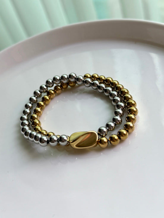 PULSERA BOLITAS DIJE IRREGULAR