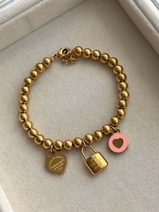 PULSERA BOLITAS DIJES