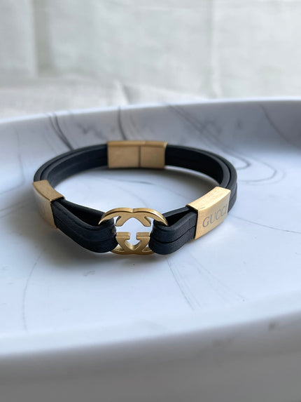 PULSERA PLACA GG DORADO