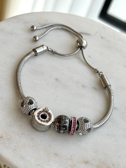 PULSERA CON CHARMS