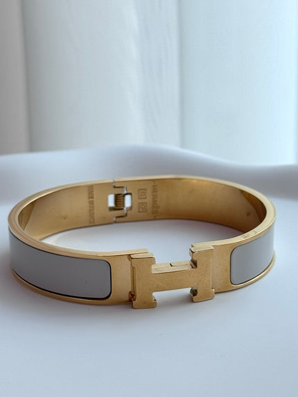 BRAZALETE H GRIS