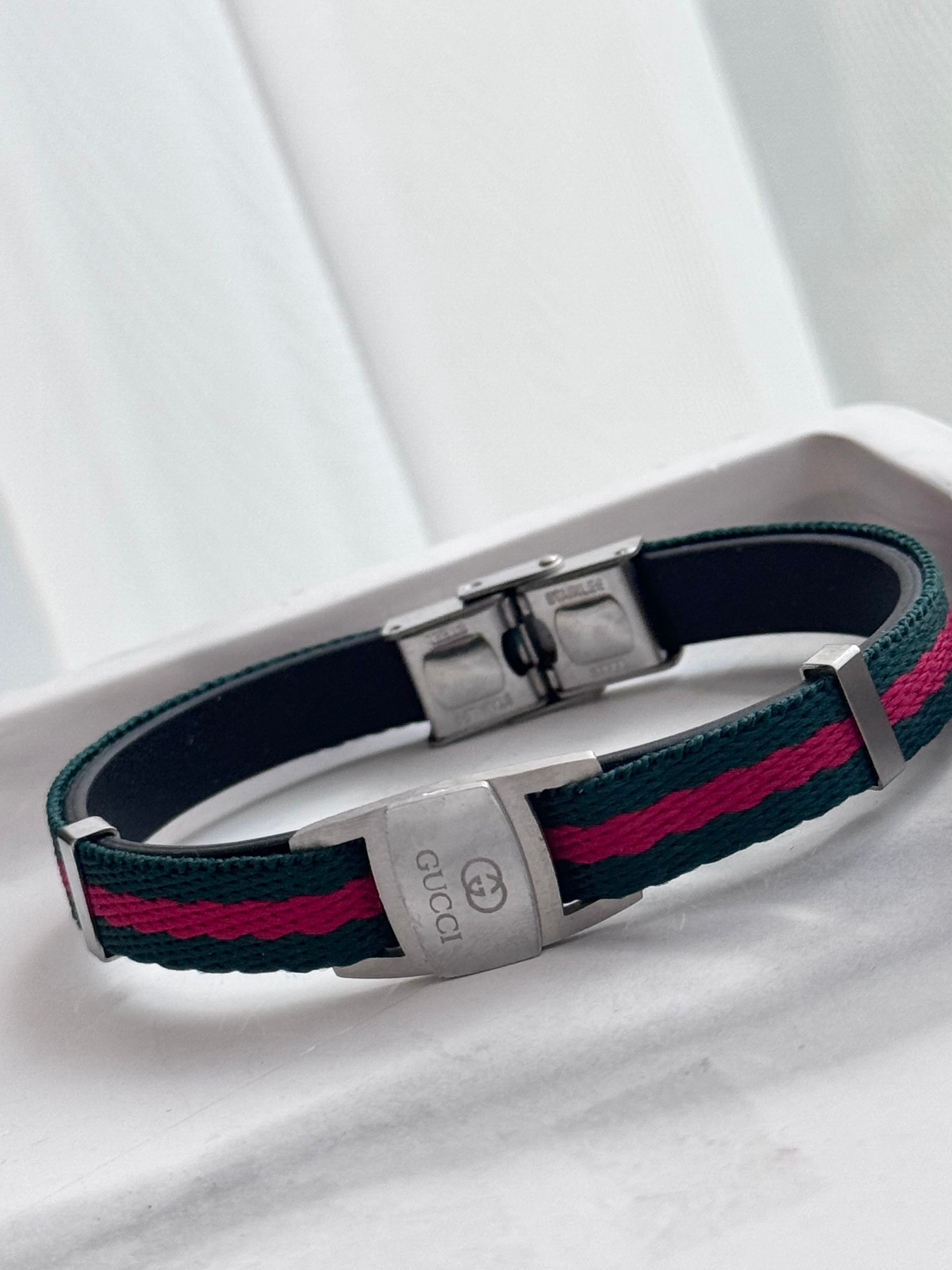 PULSERA TELA GG A LATEADA