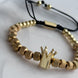 PULSERA CORONA DORADA