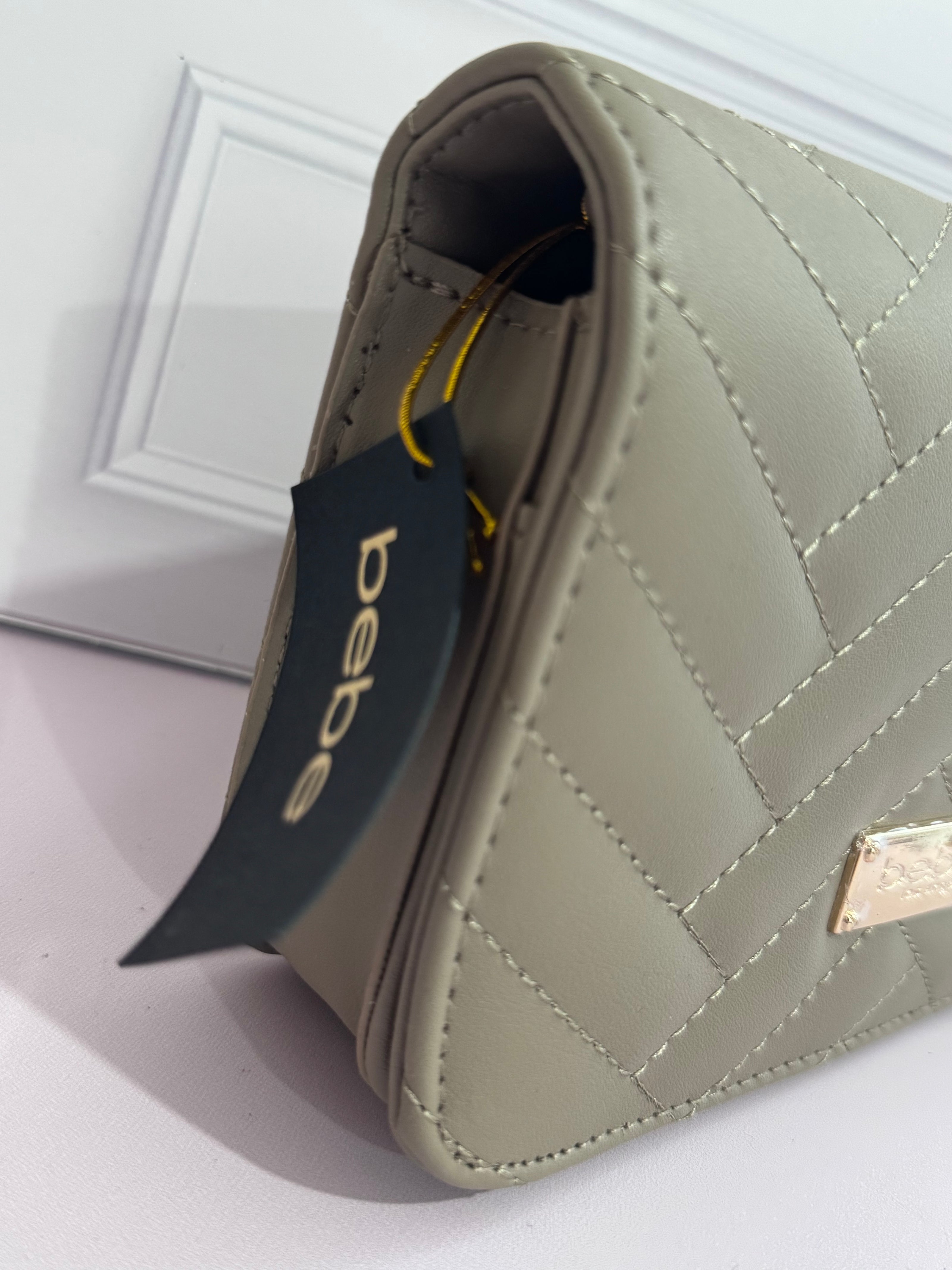 BOLSA BEBE CROSSBODY GRIS