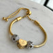 PULSERA CON CHARMS