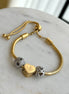 PULSERA CON CHARMS