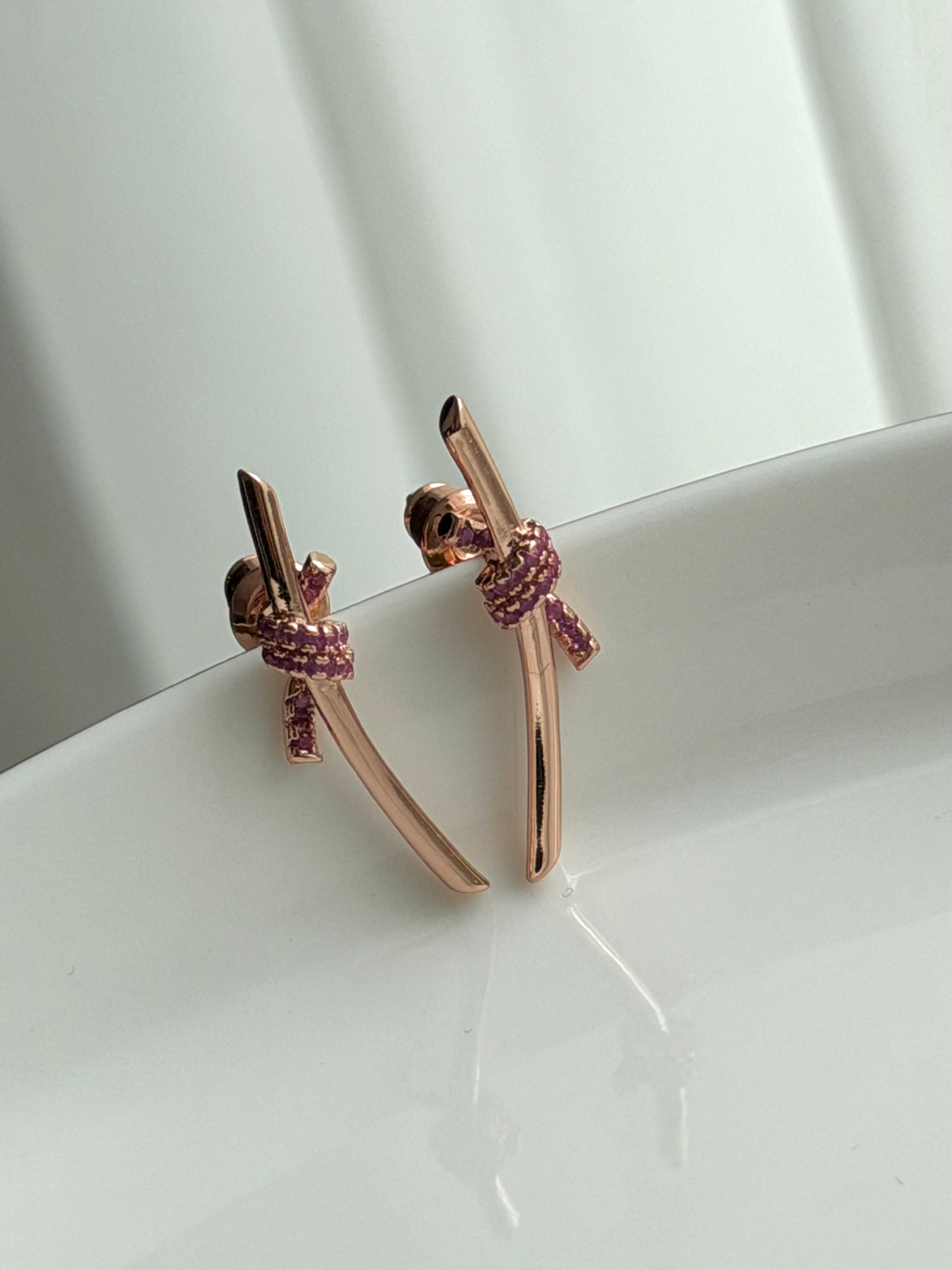ARETE NUDO ROSA