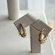 ARRACADA CON ZIRCONIA Y ARGOLLAS