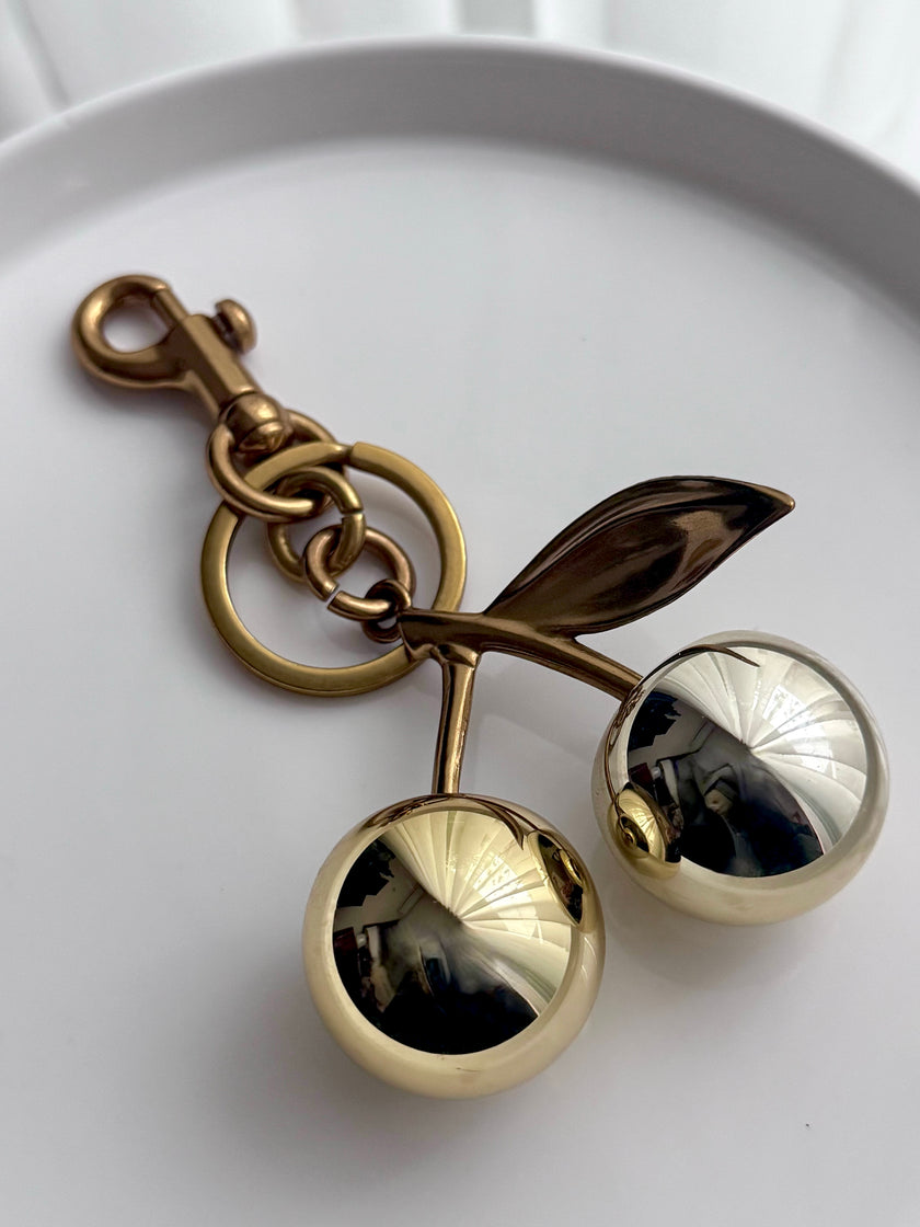 LLAVERO CEREZA DORADO