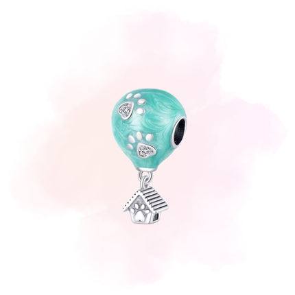 CHARM GLOBO HUELLITAS