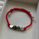 PULSERA CUERDA  LV