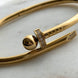 BRAZALETE CLAVO CON BOLITA Y ZIRCONIAS