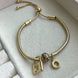 PULSERA CON CHARMS