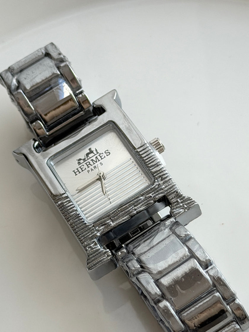 RELOJ H