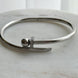 BRAZALETE CLAVO CON BOLITA Y ZIRCONIAS
