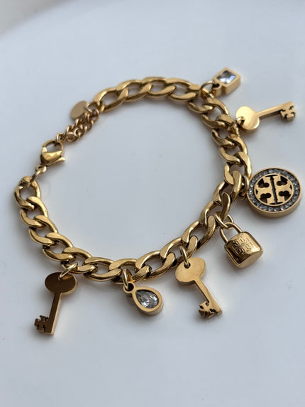 PULSERA CON DIJES TORY