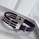 PULSERA TELA PLACA REDONDA GG