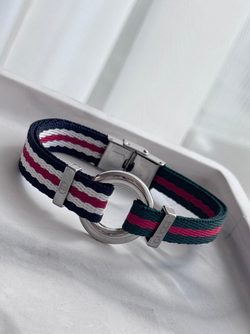 PULSERA TELA PLACA REDONDA GG