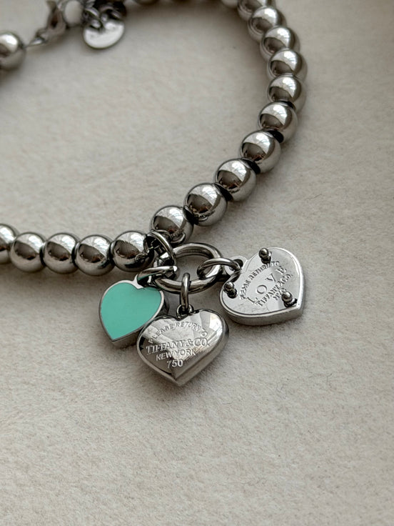 PULSERA BOLITAS CON DIJES