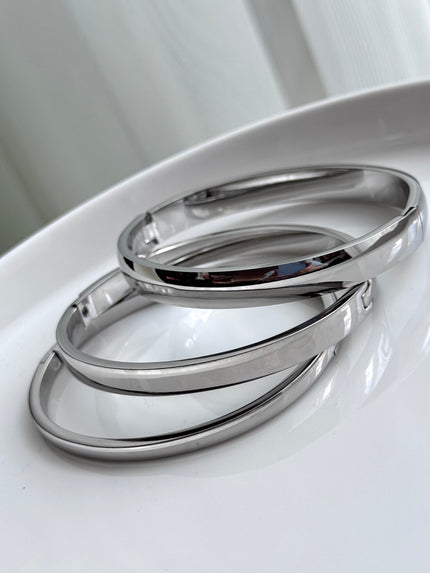 TRÍO DE BRAZALETES PLATEADO