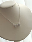 COLLAR MOÑO CRISTAL BLACO