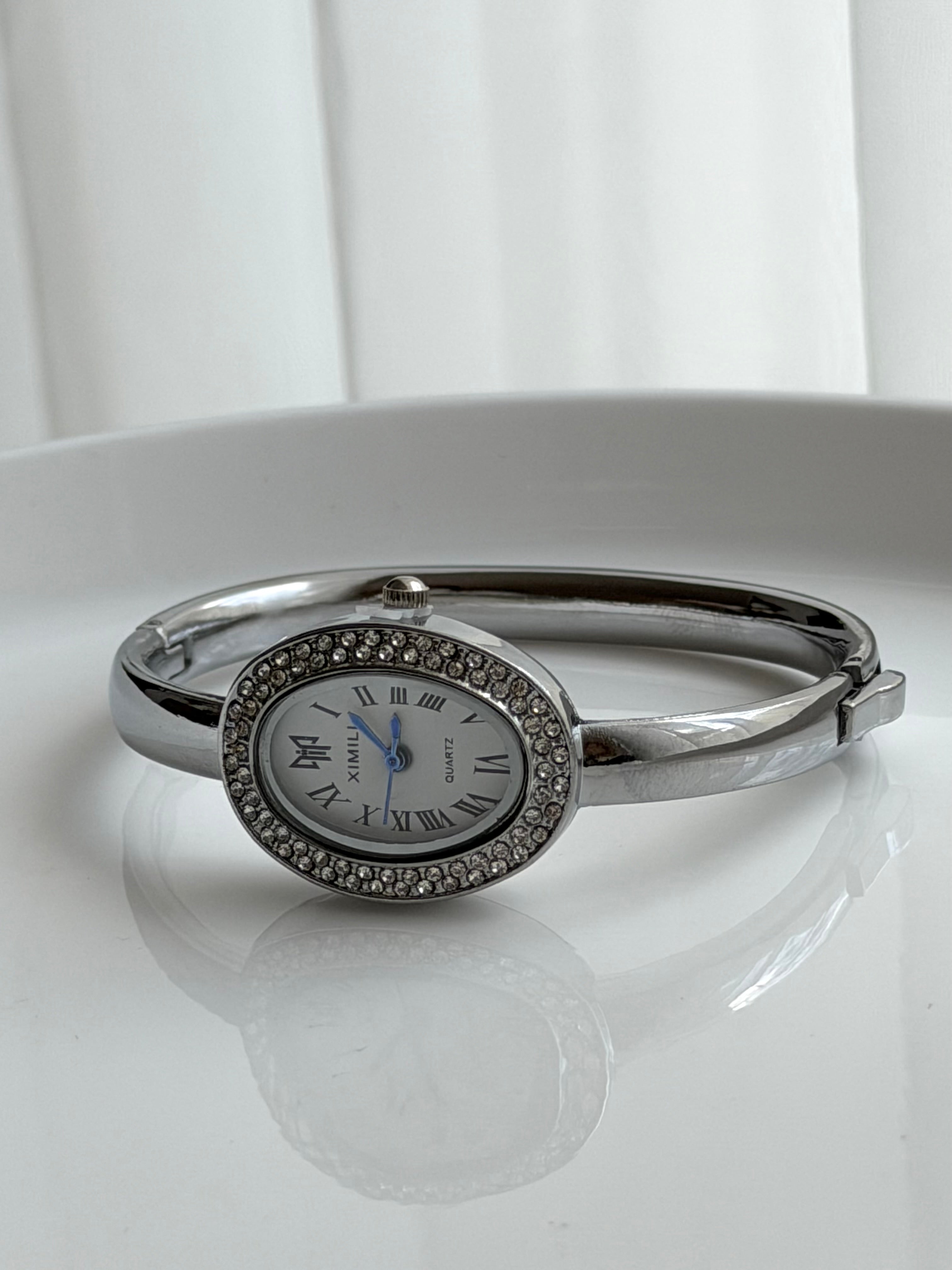 RELOJ TIPO PULSERA CON CRISTAL