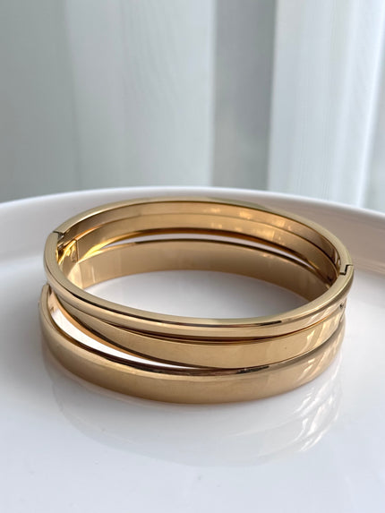 TRÍO DE BRAZALETES DORADO
