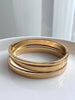 TRÍO DE BRAZALETES DORADO