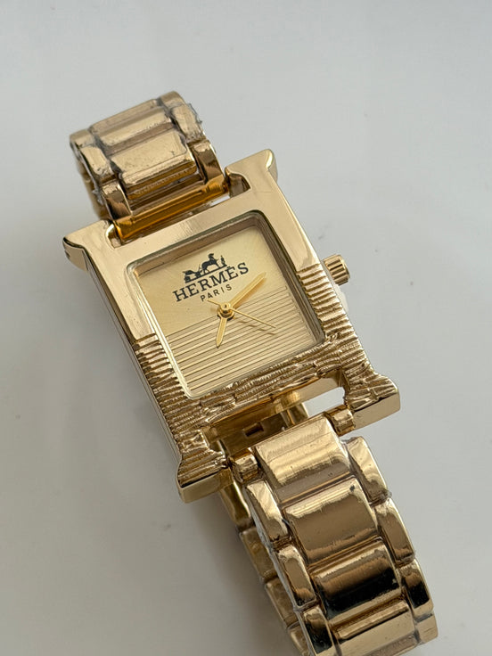 RELOJ H