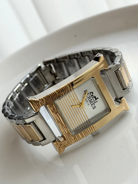 RELOJ H