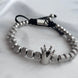 PULSERA CORONA PLATEADA
