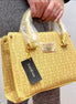 BOLSA BEBE CLUTCH AMARILLA