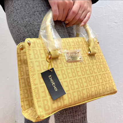BOLSA BEBE CLUTCH AMARILLA