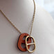 COLLAR H NARANJA