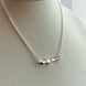 COLLAR FLECHA ROSA