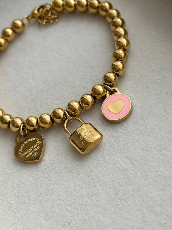 PULSERA BOLITAS DIJES