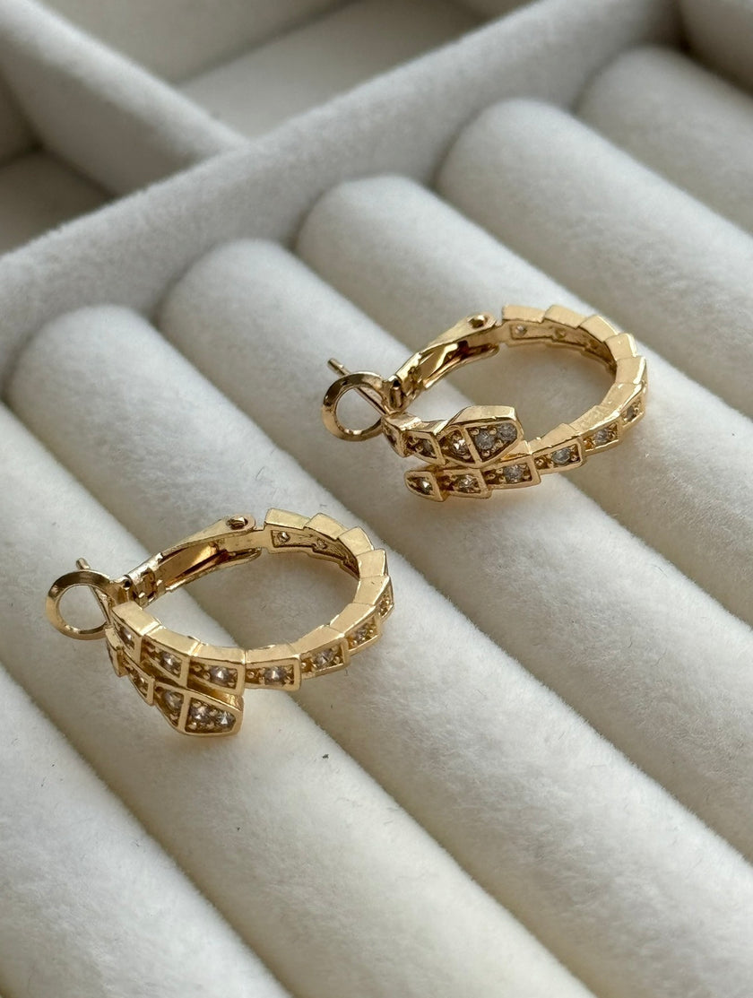 ARRACADA  SERPIENTE CON CRISTAL