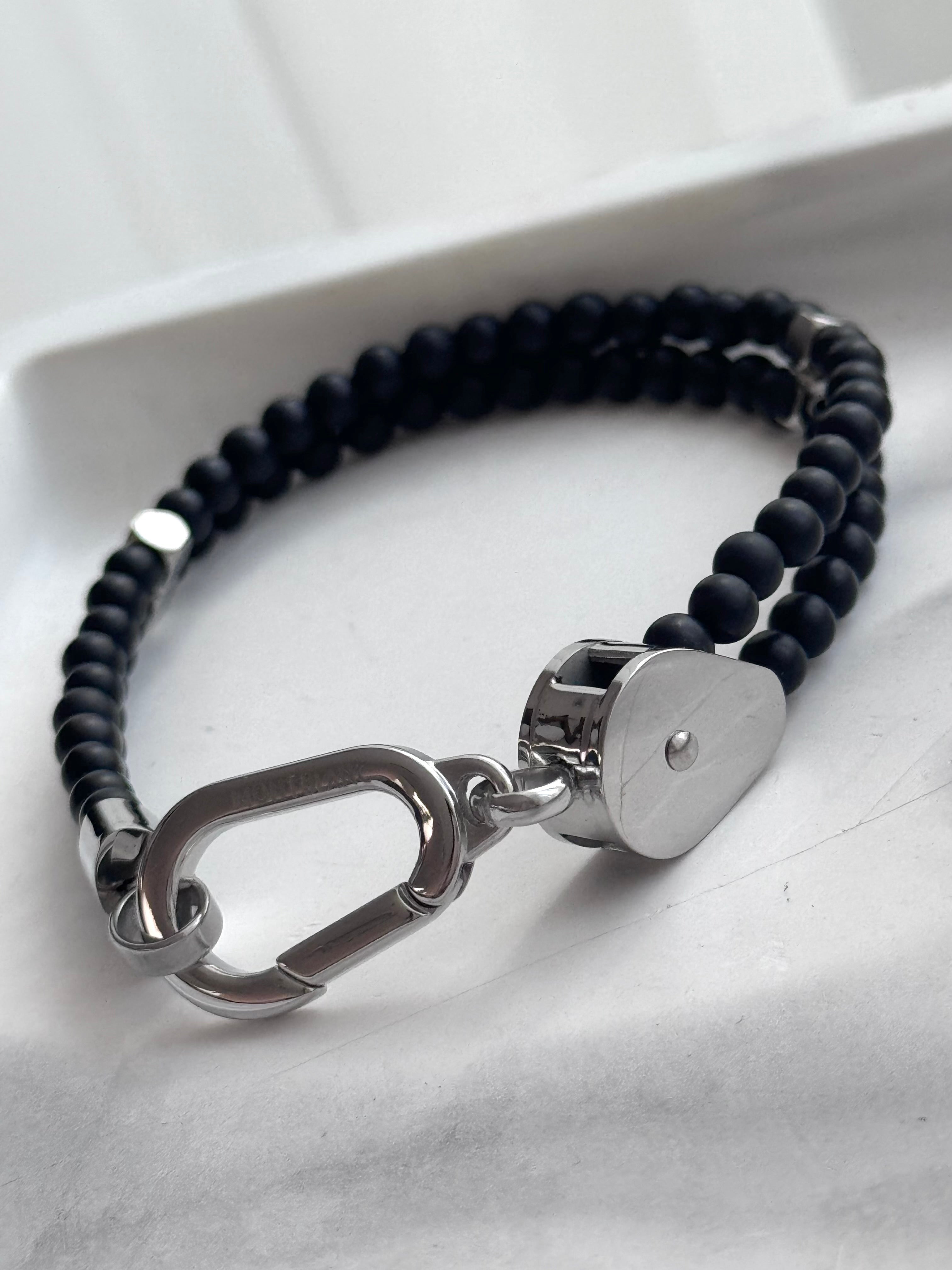 PULSERA BOLITAS NEGRAS