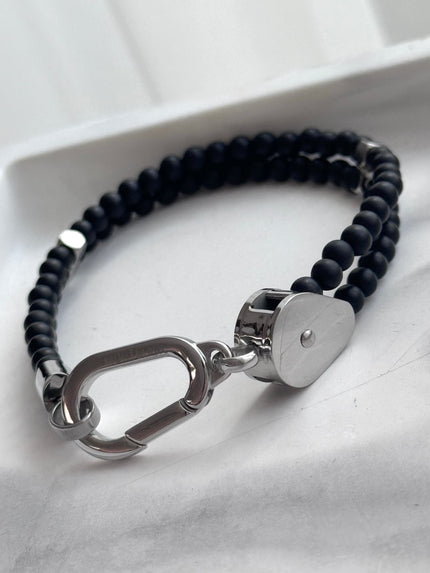 PULSERA BOLITAS NEGRAS