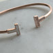 PULSERA DOBLE T ABIERTO
