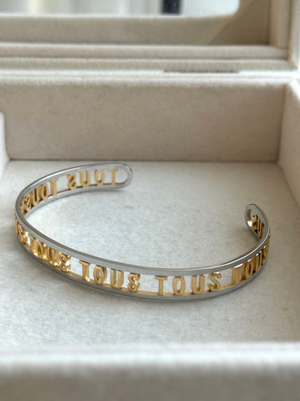 BRAZALETE ABIERTO LETRAS TOUS