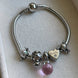 PULSERA CON CHARMS