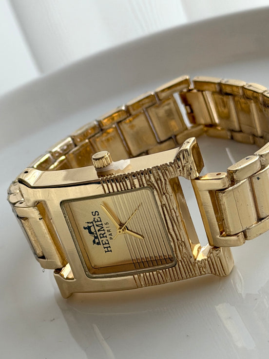 RELOJ H