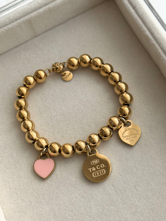 PULSERA BOLITAS CON DIJES