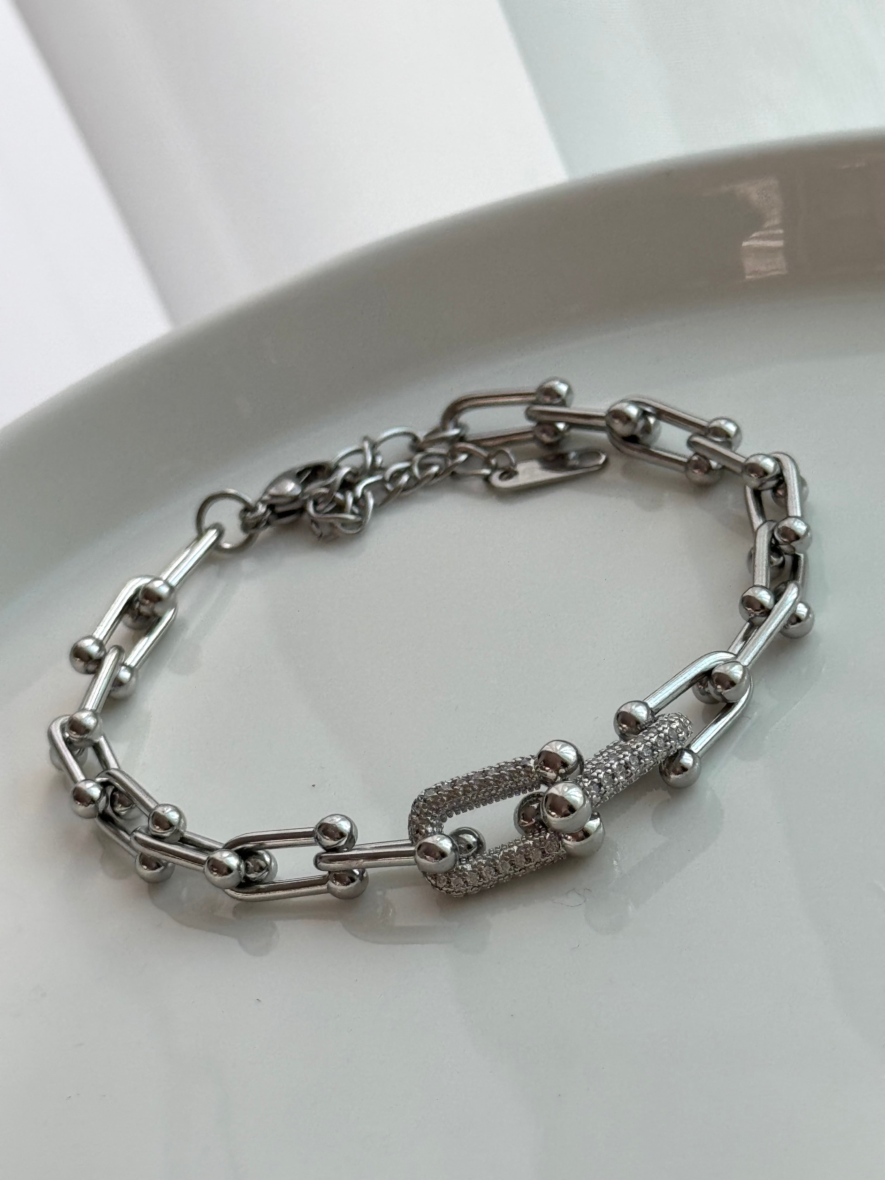 PULSERA ESLABONES CON CRISTAL PLATEADO