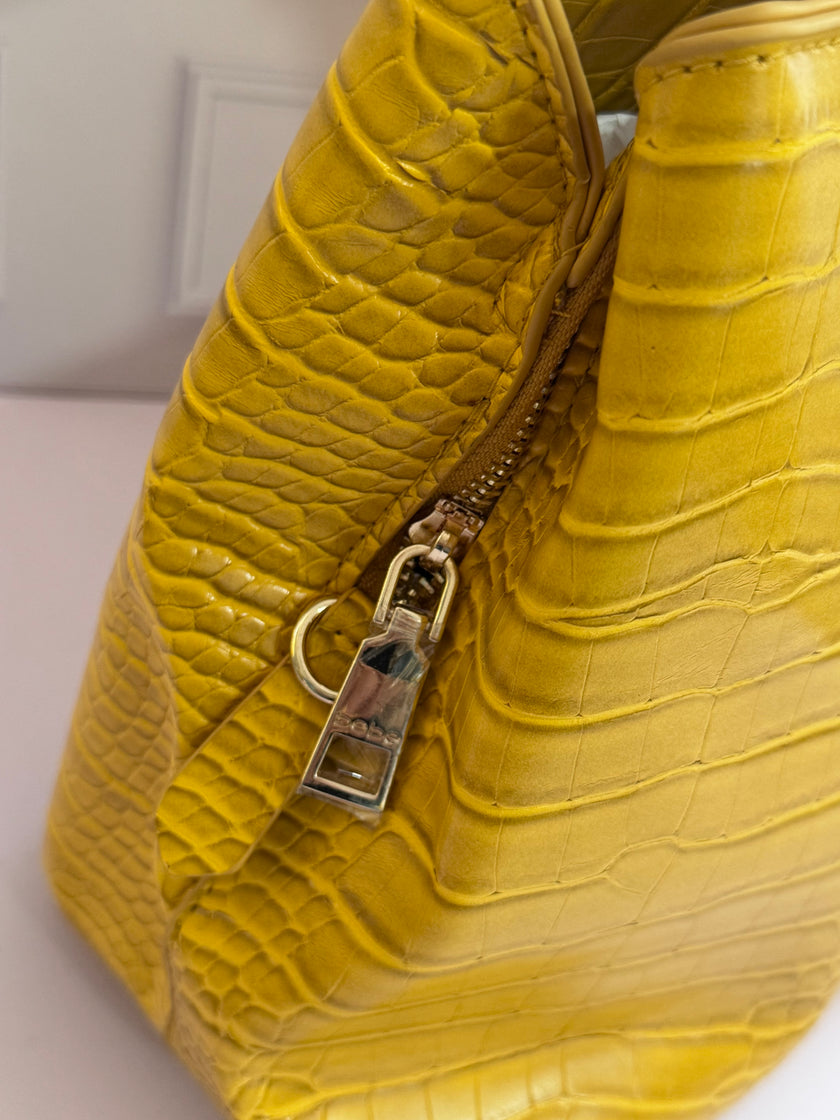 BOLSA BEBE AUBREY CROCO AMARILLA