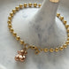 PULSERA BOLITAS CON OSO