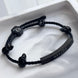 PULSERA TRENZADA CALAVERAS NEGRAS
