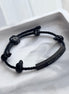 PULSERA TRENZADA CALAVERAS NEGRAS