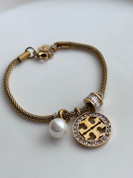 PULSERA DIJE TORY